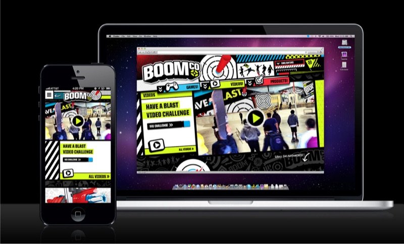 BOOMco. site with bold graphic patterns shown on a laptop and a phone